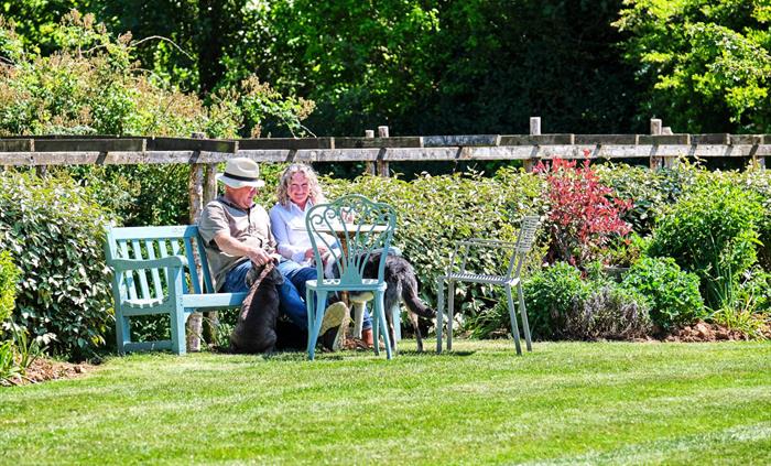Your hosts sitting in the garden